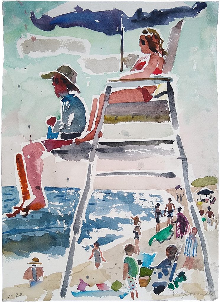 Two lifeguards sitting on the stand at the ocean